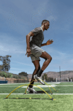 איש מאמן עם משוכות אימון עלית